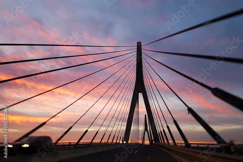 Bridge border between Portugal and Spain at sunset