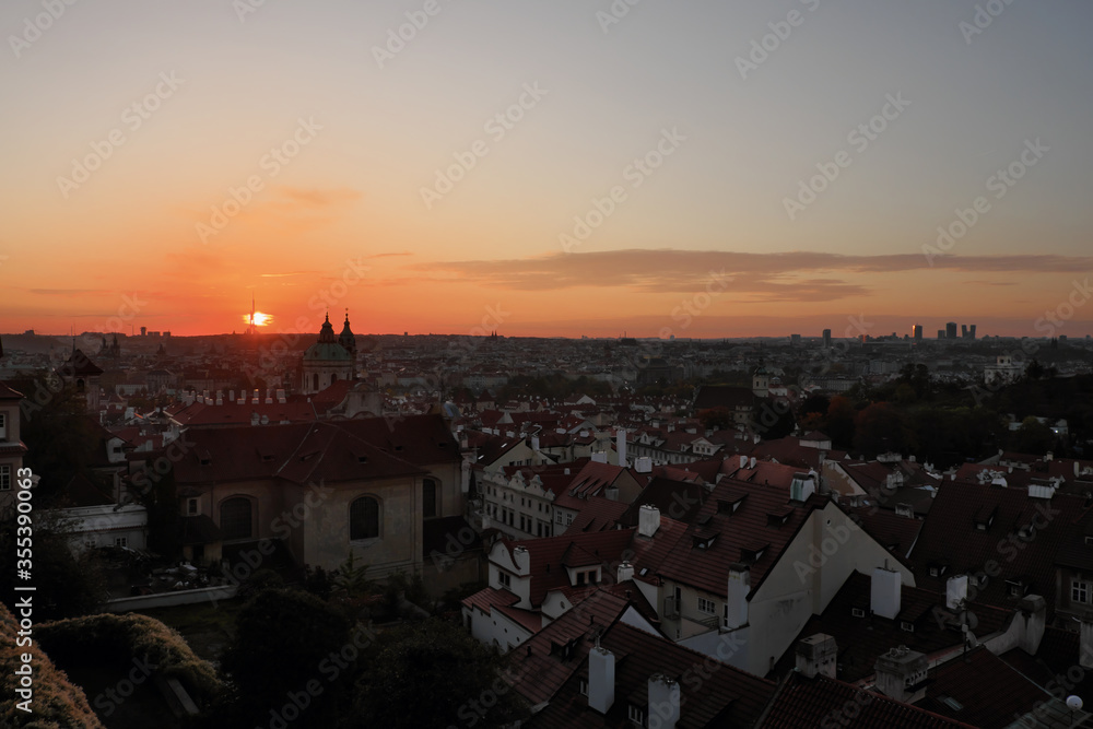 Dawn over Prague. The urban skyline of an ancient European city at dusk.