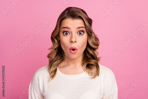 Close-up portrait of her she nice-looking attractive lovely pretty charming cute cheerful amazed wavy-haired girl cool news reaction pout lips isolated over pink pastel color background