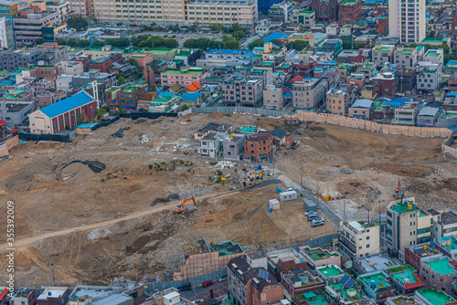 Few houses left standing in the middle of a construction site at Daegu, Republic of Korea