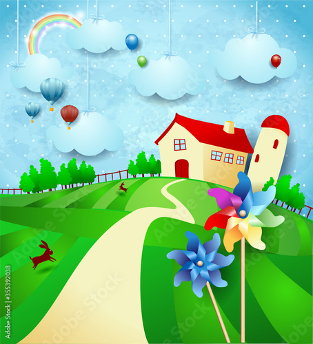 Fantasy landscape with farm, pinwheels and hanging clouds