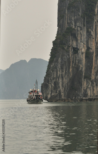 Boat Near the Rock at Ha Long Bay Vietnam