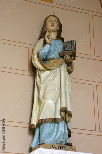 Saint Cecilia statue in the church of St. John the Baptist in Sveti Ivan Zabno, Croatia photo