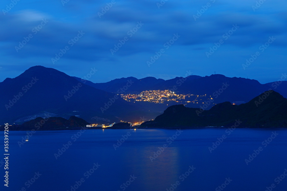 Naklejka premium The Jiufen old street at night in Taipei Taiwan, a popular tourist and local destination