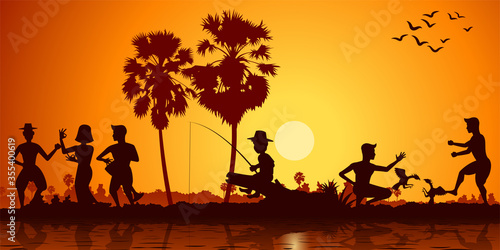 Billede på lærred Country life drum dance,fishing and cock fight gambling,sunset time silhouette s