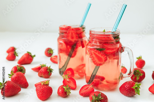 Healthy strawberry drink with berries and wooden board. Diet drink, healthy concept © artifirsov