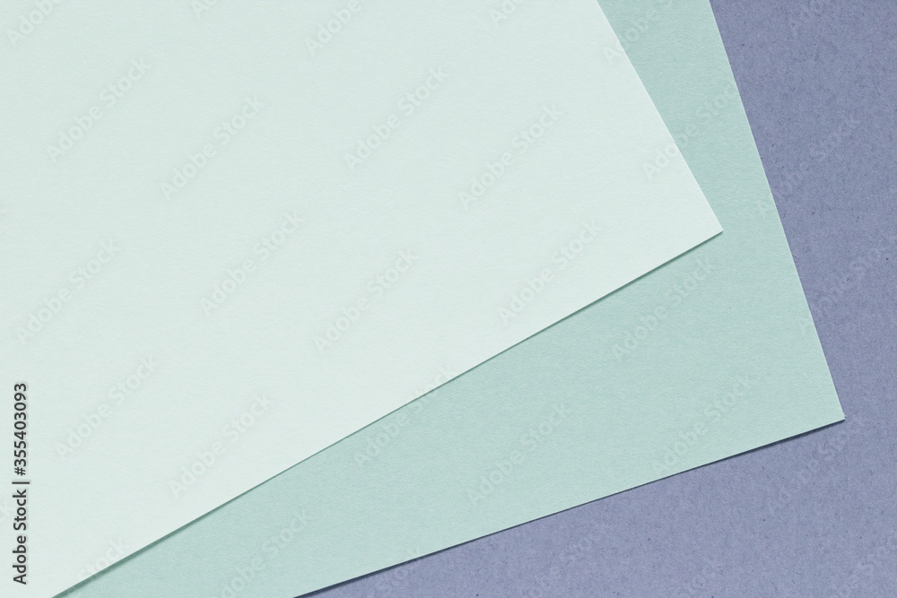 Color paper background. Blue  green paper layers top view