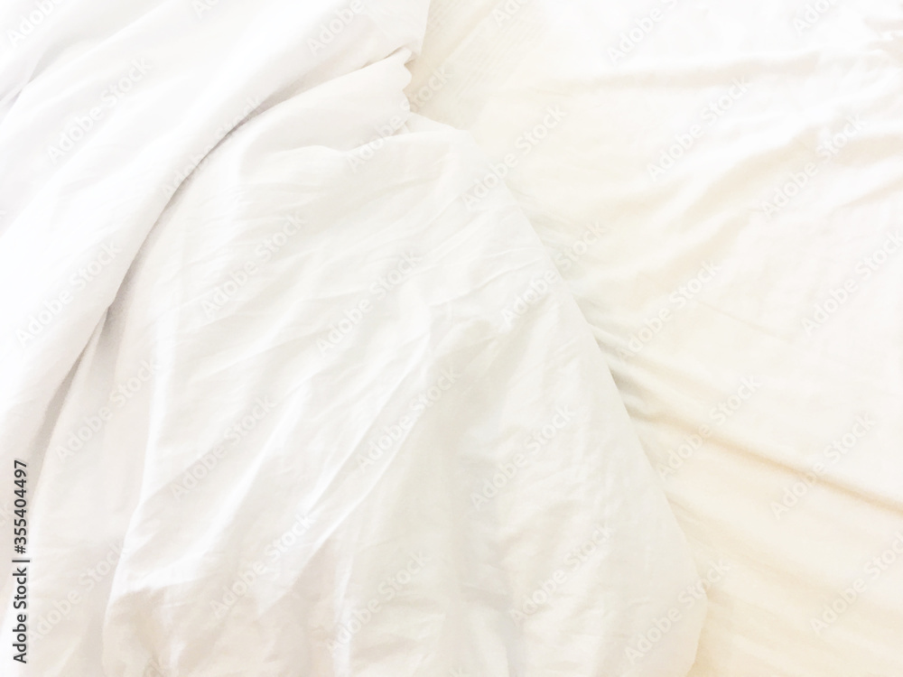 wrinkle messy blanket in bedroom after waking up in the morning, from sleeping in a long night, details of duvet and blanke wrinkle messy blanket in bedroom after waking up in the morning, from sleeping in a long night, details of duvet and blanke