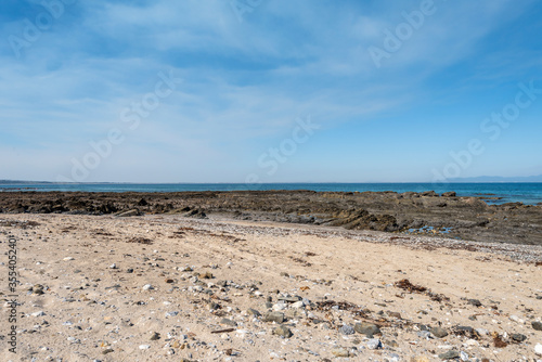 Empty Large Rocky Coastal Seaside Scene and Beach on a Sunny Day