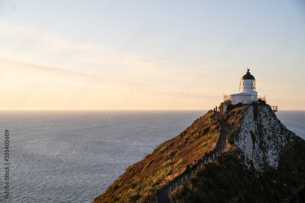 A part of Nugget Point is one of the most beautiful landforms along the Otago coast of New Zealand with a lighthouse and a scattering of rocky islets.