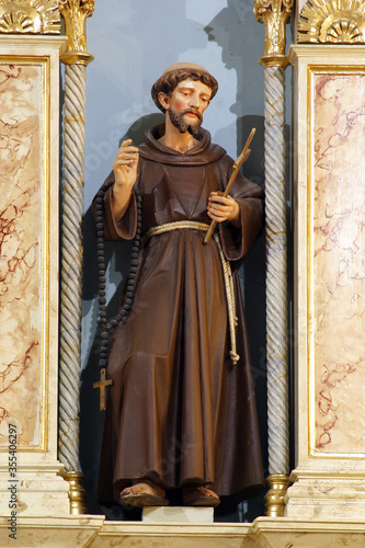 Saint Francis of Assisi, statue on the main altar in the parish church of the Holy Trinity in Donja Stubica, Croatia photo