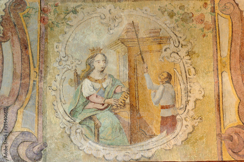 Saint Cecilia, a fresco at Holy Trinity Parish Church in Donja Stubica, Croatia photo