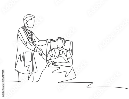 Continuous line drawing of young doctor visit a patient laying at bed in hospital and handshaking him to ask the condition - one line drawing vector