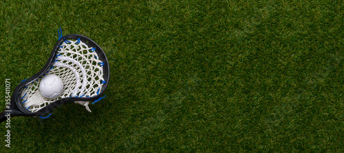 Принти на полотні Abstract view of a lacrosse stick scooping up a ball