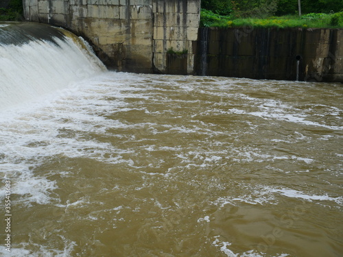 water flowing over the river