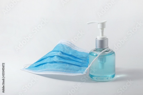 Coronavirus prevention medical  masks and hand sanitizer gel 
concept hygiene Covid19 protection.