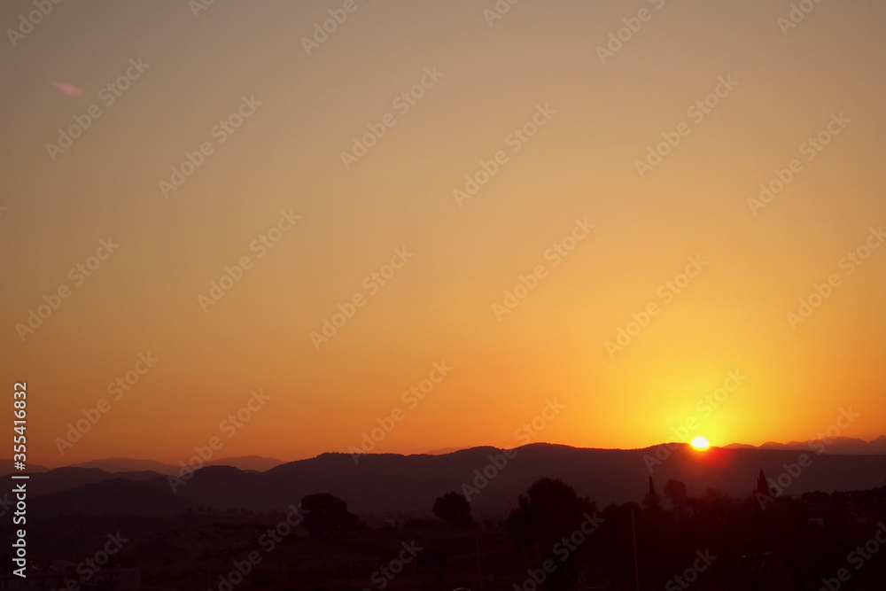 romantic sunrise landscape over the turkish Taurus mountains in summer day