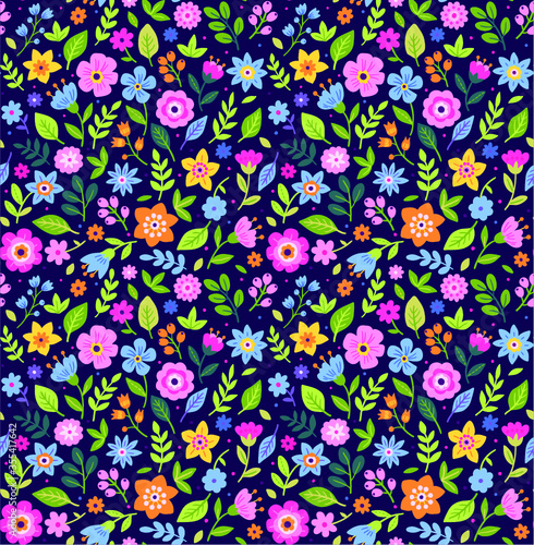 Cute Floral pattern in the small flower. "Ditsy print". Motifs scattered random. Seamless vector texture. Elegant template for fashion prints. Printing with small colorful flowers. Blue background. © ann_and_pen
