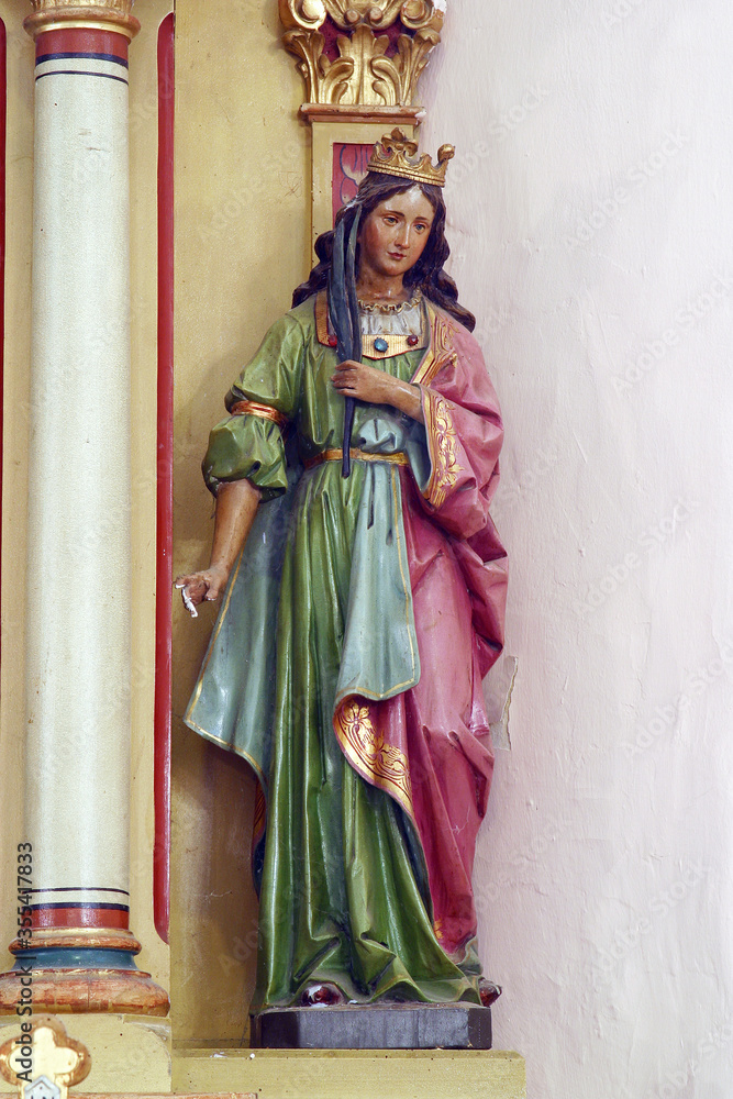 St. Catherine of Alexandria, statue on the altar of St. Barbara in the parish church of the Assumption of the Virgin Mary in Pescenica, Croatia