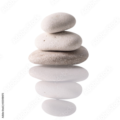 Pile of spa stones isolated over white background.