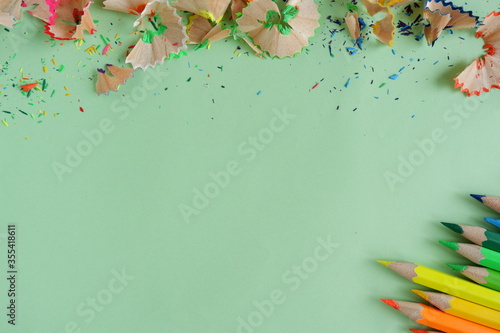 Background from color pencils on green paper.