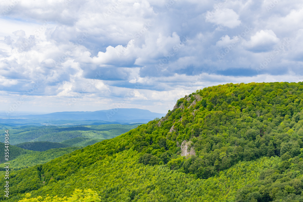 Tar kő peak seen from Három kő in the Bükk mountains near Miskolc, Hungary on a sunny and overcast day