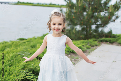 little girl in a white dress