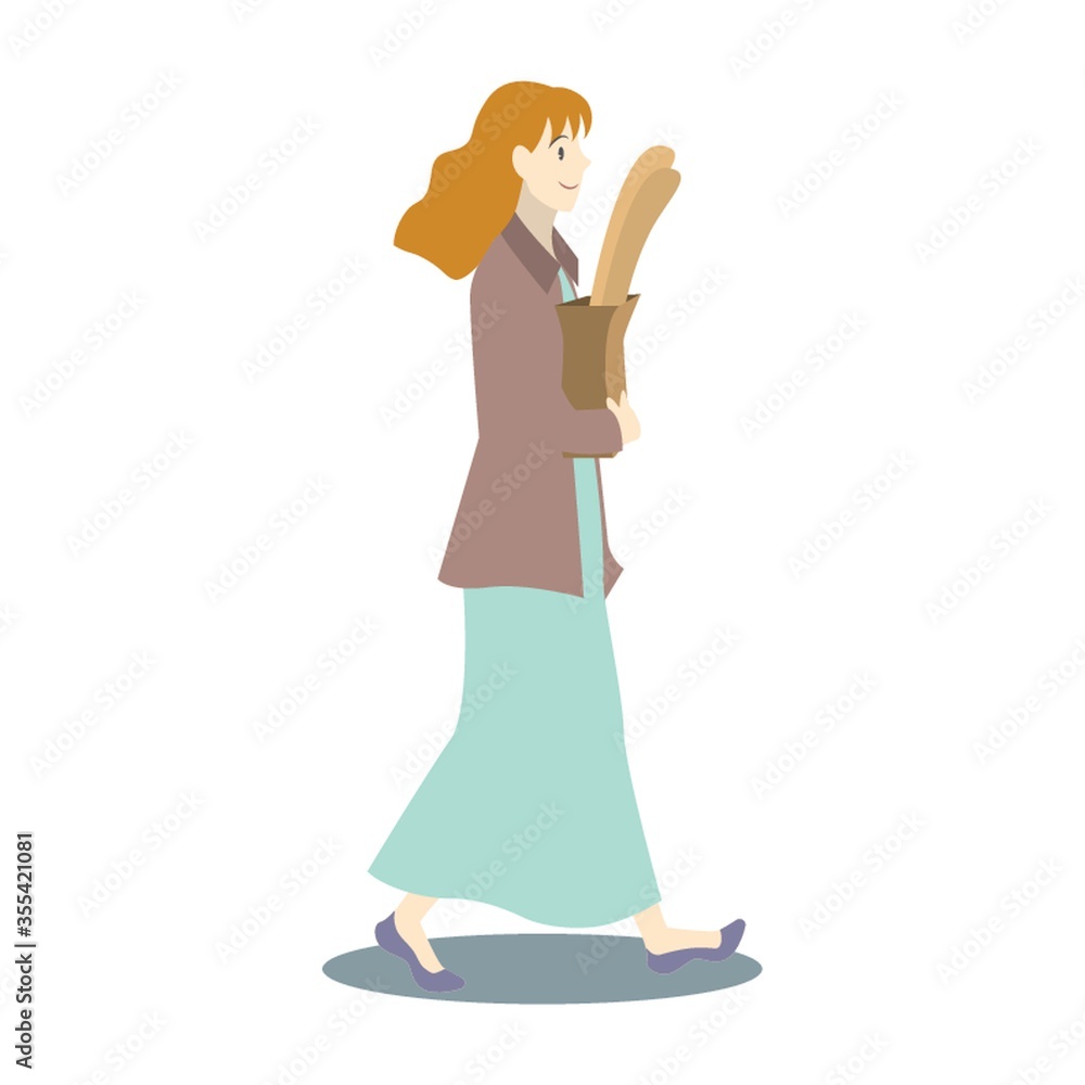 Obraz premium woman walking with grocery bag