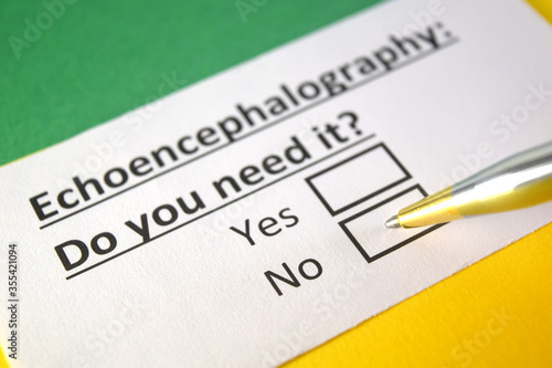 One person is answering question about echoencephalography. photo