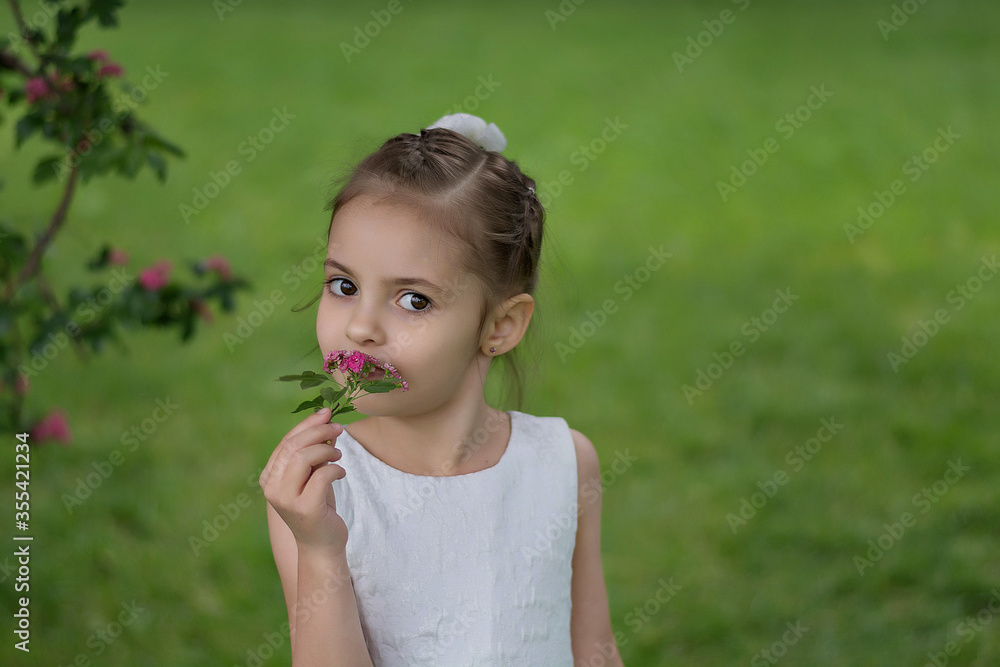 happy little girl on the beach. little girl in a white dress. little girl lying on the grass. little girl walking on the road happy little girl on the beach. little girl in a white dress. little girl lying on the grass. little girl walking on the road