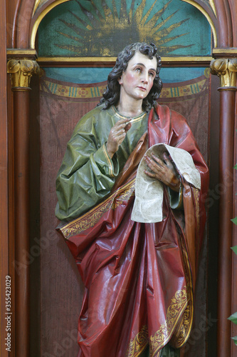 Saint John statue on the altar of Saint Florian in the parish church of St. Nicholas in Krapina, Croatia