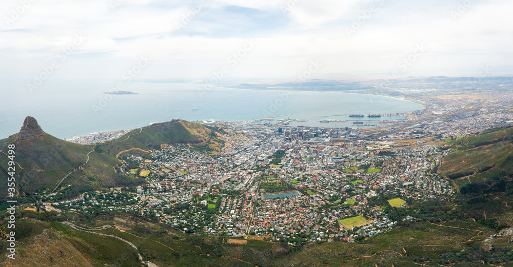 panoramic views of cape town city in south africa from the bottom of the table mountain in south africa in a cloudy day