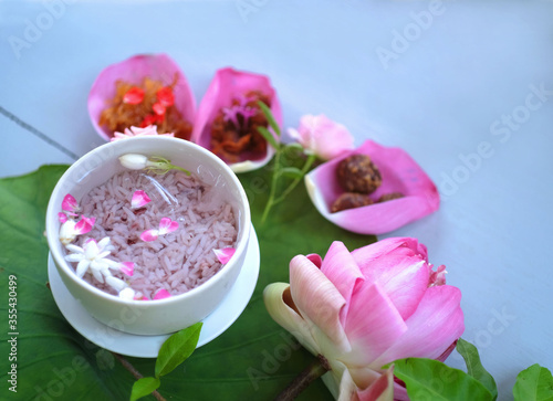 Thai Royal Cuisine "Kao Chae" cooked rice soked in ice and cold water with jasmine flower, eaten with the usual 