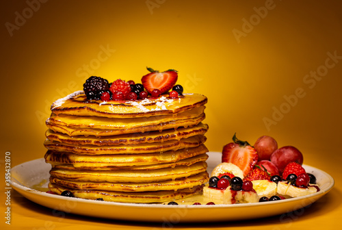 American pancakes with fruits - dessert photo