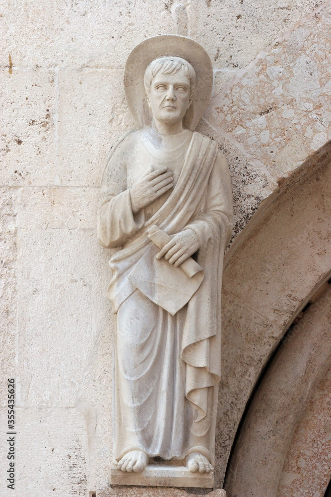 Saint, statue on the portal Cathedral of St Anastasia in Zadar, Croatia