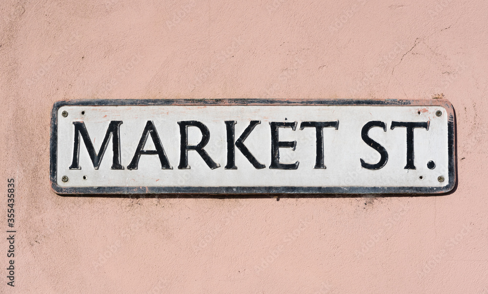 Street sign on wall saying Market Street located in Market St, Newport, Pembrokeshire. Wales. UK Street sign on wall saying Market Street located in Market St, Newport, Pembrokeshire. Wales. UK