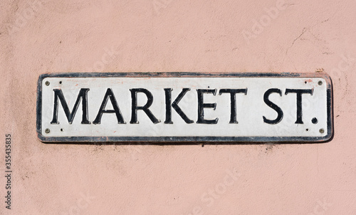 Street sign on wall saying Market Street located in Market St, Newport, Pembrokeshire. Wales. UK © david