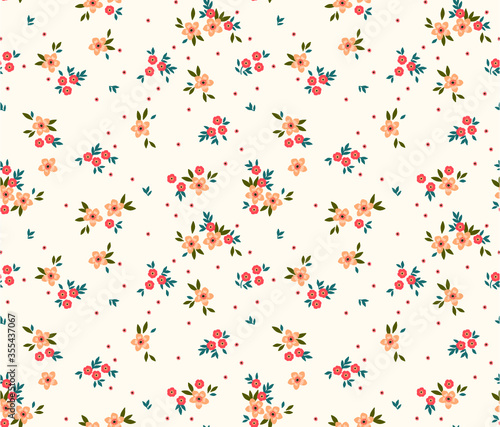 Floral pattern. Pretty flowers on white background. Printing with small light orange flowers. Ditsy print. Seamless vector texture. Spring bouquet.