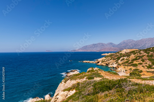 Panoramic view of a sea and islands from the top of the mountain, on the island of Crete, Greece. © max