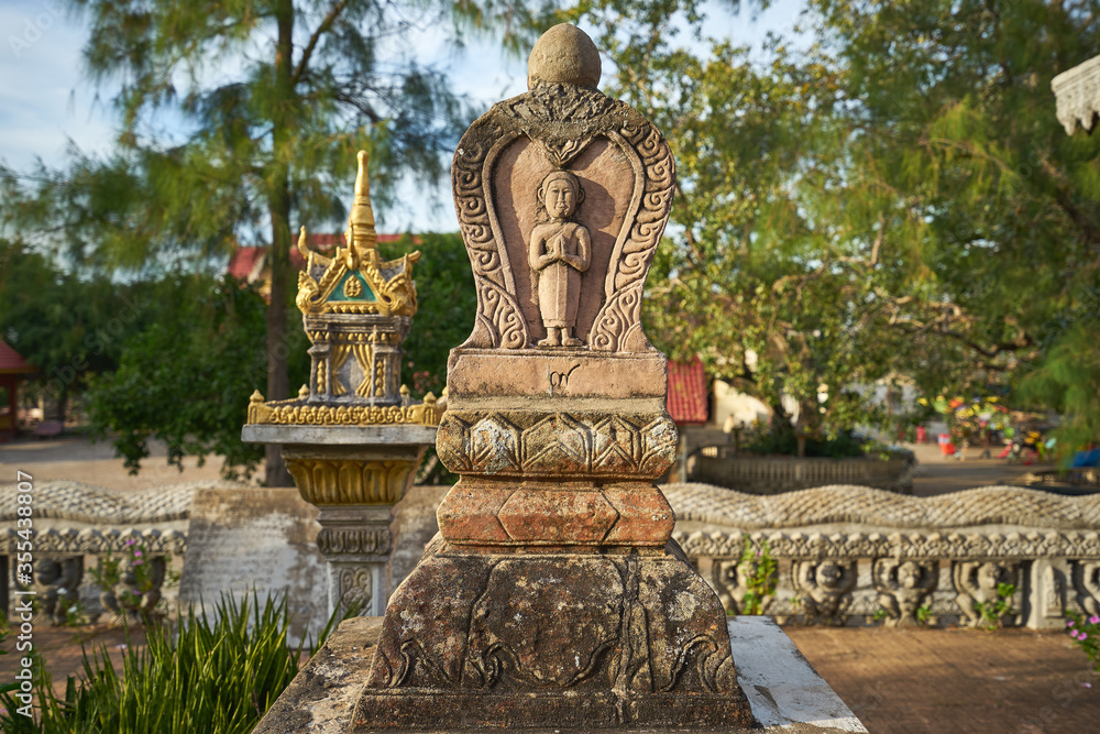 Stone buddhist shrine at Phnom Bros Pagoda in Kampong Cham Province, Cambodia Stone buddhist shrine at Phnom Bros Pagoda in Kampong Cham Province, Cambodia
