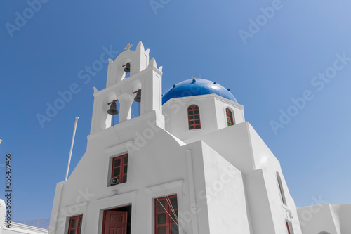 Santorini Church Bells at Oia village look out to Aegean sea, Santorini, Greece