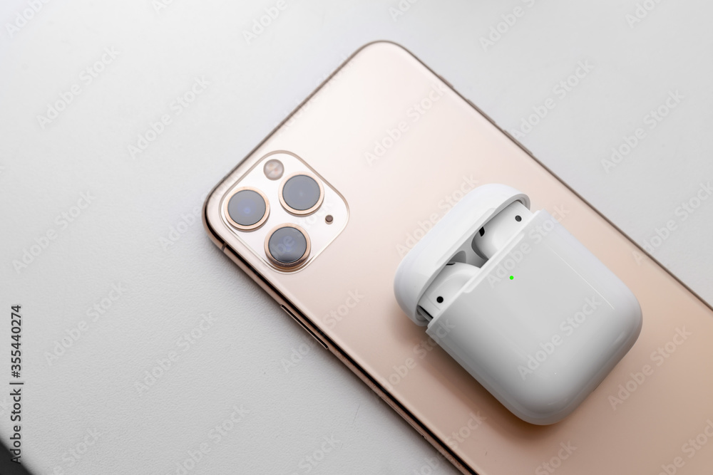 white wireless headphones on a background white wireless headphones on a background
