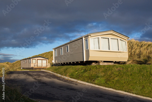 Static caravan holiday homes at Llangennith on the Gower Peninsular in winter which is out of season, the caravans are closed up until spring. © Jackie Davies