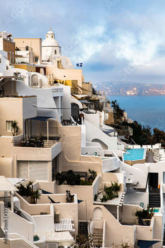 Santorini. Greece. Houses, sky and sea. Landscape. Vertical photo.