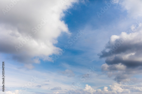 Summer day and blue sky with volumetric clouds. White clouds and blue sky.