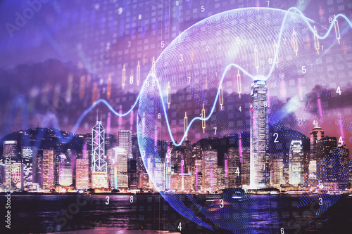 Double exposure of forex chart drawings over cityscape background. Concept of success.