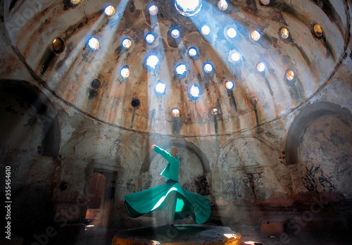 Colored Whirling Dervishes or Whirling Dervishes ,sufi semazen Mevlana, Konya, Turkey - 15 08 2015