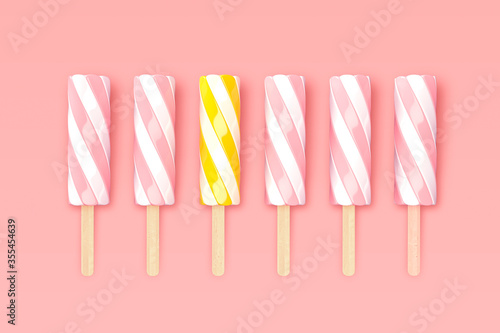 sweet twisted marshmallow or ice cream on wooden stick isolated on pink glamour background - exception outstand photo