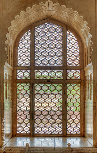 Intricate Window (Jali) at the Bibi ka Maqbara, built by Azam Shah in 1678, as a son's tribute to his mother, Begum Rabia Durrani, the Queen of Mughal emperor Aurangzeb. Aurangabad, Maharashtra, India photo