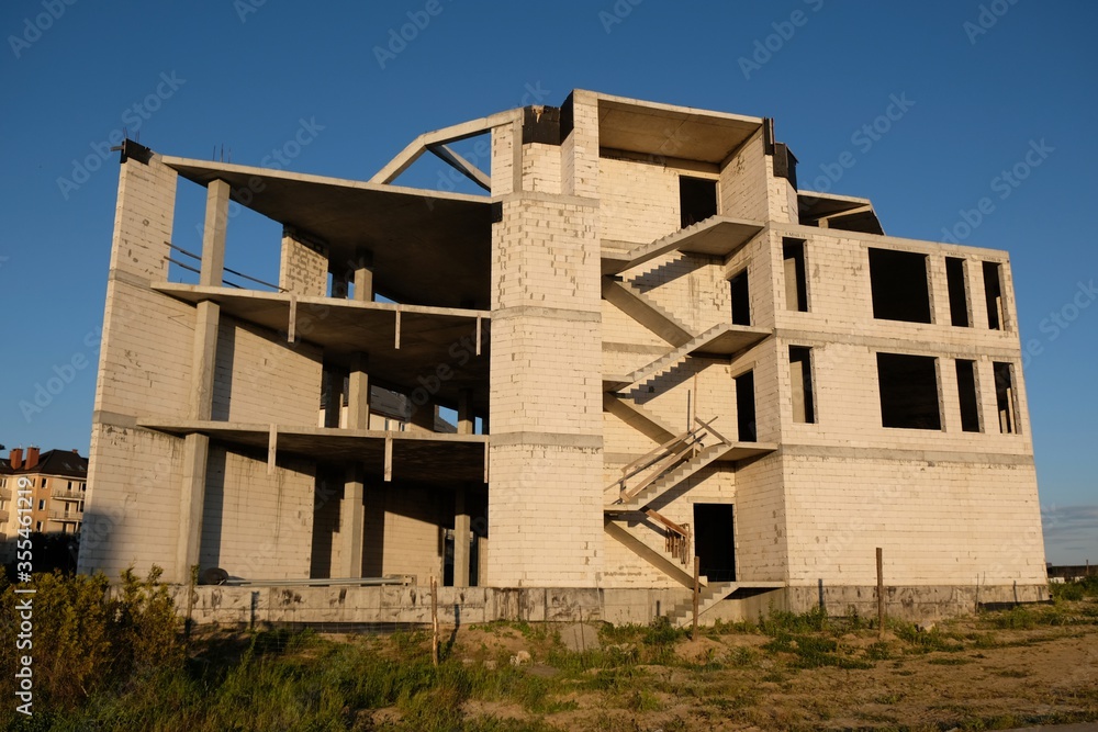 Construction of a new unfinished residential building. View of the stairs structure. Construction of a new unfinished residential building. View of the stairs structure.